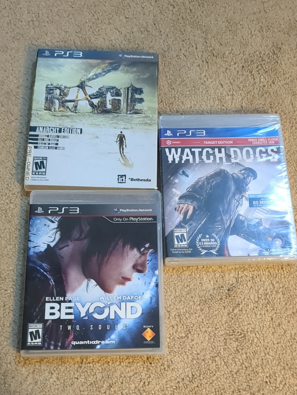 Sony PS3 Game Lot — Watch Dogs, Beyond: Two Souls, Rage (black, white, blue)